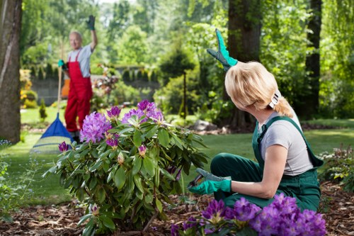 Gardening staff using safe working practices and supervision